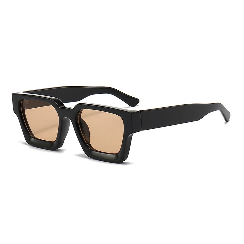 Black frame champagne colored lens